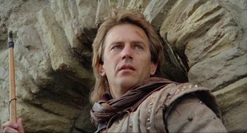 Movie still from “Robin Hood: Prince of Thieves” (1991), directed by Kevin Reynolds – A person with long hair; Close Up shot, Low angle