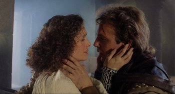 Movie still from “Robin Hood: Prince of Thieves” (1991), directed by Kevin Reynolds – A man and a woman are looking into each others eyes; Close Up shot, Low angle