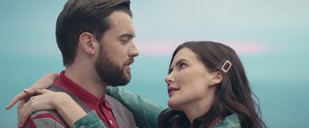 Movie still from “Robots” (2023), directed by Casper Christensen – A man and a woman looking into each others eyes; Close Up shot, Low angle