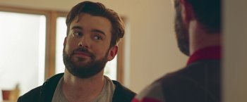 Movie still from “Robots” (2023), directed by Casper Christensen – A man with a goatee looking into a mirror; Close Up shot, Over the shoulder angle