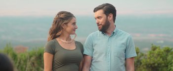 Movie still from “Robots” (2023), directed by Casper Christensen – A man and a woman standing next to each other; Close Up shot, Over the shoulder angle