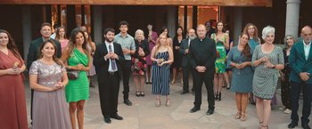 Movie still from “Robots” (2023), directed by Casper Christensen – A group of men and women standing in front of each other; Wide shot, Low angle