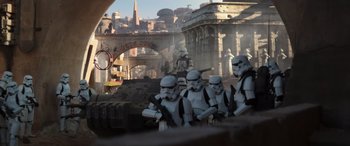 Movie still from “Rogue One: A Star Wars Story” (2016), directed by Gareth Edwards – A group of stormtroopers standing next to each other; Wide shot, Low angle