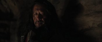 Movie still from “Rogue One: A Star Wars Story” (2016), directed by Gareth Edwards – A person with long black hair; Close Up shot, Low angle