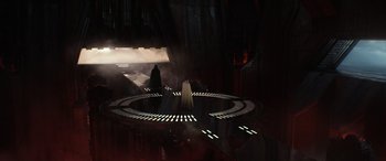Movie still from “Rogue One: A Star Wars Story” (2016), directed by Gareth Edwards – A group of people standing on a platform; Extreme Wide shot, High angle