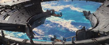 Movie still from “Rogue One: A Star Wars Story” (2016), directed by Gareth Edwards – An aerial view of the earth taken from a space station; Extreme Wide shot, Overhead angle
