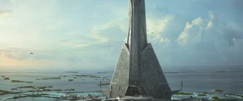 Movie still from “Rogue One: A Star Wars Story” (2016), directed by Gareth Edwards – An image of a large building in the middle of the ocean; Extreme Wide shot, Low angle