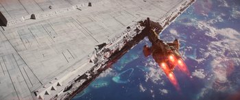 Movie still from “Rogue One: A Star Wars Story” (2016), directed by Gareth Edwards – An aerial view of a space ship in the sky; Extreme Wide shot, Overhead angle