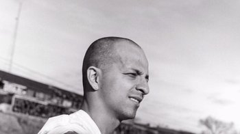 Movie still from “Rolling Like Thunder” (2021), directed by Roger Gastman – A man with a shaved head is looking to his left; Close Up shot, Low angle
