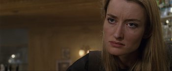 Movie still from “Ronin” (1998), directed by John Frankenheimer – A person looking at the camera; Close Up shot, Over the shoulder angle