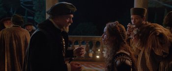 Movie still from “Rosaline” (2022), directed by Karen Maine – A man and a woman talking to each other outside; Medium shot, Over the shoulder angle