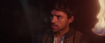 Movie still from “Rosaline” (2022), directed by Karen Maine – A person wearing a leather jacket; Close Up shot, Over the shoulder angle