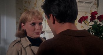 Movie still from “Rosemary's Baby” (1968), directed by Roman Polanski – A man and a woman talking to each other; Close Up shot, Over the shoulder angle