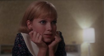 Movie still from “Rosemary's Baby” (1968), directed by Roman Polanski – A person with her hands on her chin; Close Up shot, Low angle