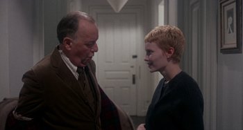 Movie still from “Rosemary's Baby” (1968), directed by Roman Polanski – A man and a woman talking to each other; Medium shot, Over the shoulder angle