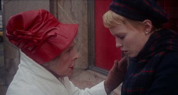 Movie still from “Rosemary's Baby” (1968), directed by Roman Polanski – An older woman and a young boy touching each other's face; Close Up shot, Over the shoulder angle