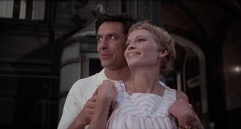 Movie still from “Rosemary's Baby” (1968), directed by Roman Polanski – A man and a woman standing next to each other; Close Up shot, Low angle
