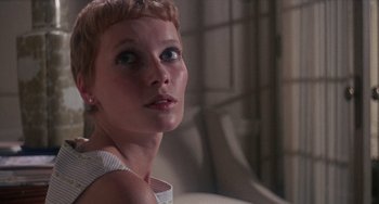 Movie still from “Rosemary's Baby” (1968), directed by Roman Polanski – A person with short blonde hair; Close Up shot, Low angle