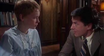 Movie still from “Rosemary's Baby” (1968), directed by Roman Polanski – A man and a woman talking to each other; Close Up shot, Over the shoulder angle