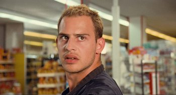Movie still from “Run Lola Run” (1998), directed by Tom Tykwer – A person in a grocery store; Close Up shot, Low angle