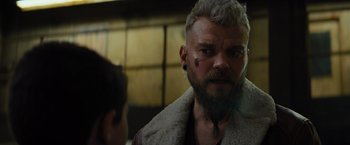 Movie still from “Samaritan” (2022), directed by Julius Avery – A person with a beard; Close Up shot, Over the shoulder angle