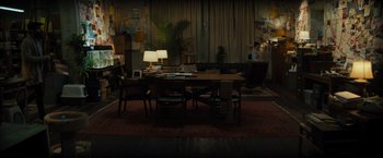 Movie still from “Samaritan” (2022), directed by Julius Avery – A room with a lot of furniture in it; Extreme Wide shot, High angle