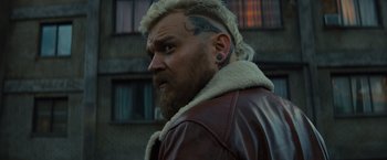 Movie still from “Samaritan” (2022), directed by Julius Avery – A person wearing a jacket; Close Up shot, Over the shoulder angle