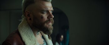 Movie still from “Samaritan” (2022), directed by Julius Avery – A person with a beard; Close Up shot, Over the shoulder angle