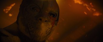 Movie still from “Samaritan” (2022), directed by Julius Avery – The face of a person wearing a hockey mask; Close Up shot, Low angle