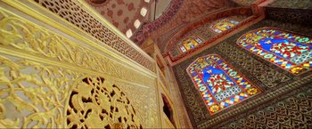 Movie still from “Samsara” (2011), directed by Ron Fricke – The interior of an ornate building with stained - glass windows; Extreme Wide shot, Low angle