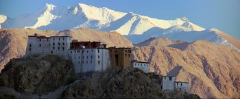 Movie still from “Samsara” (2011), directed by Ron Fricke – A view of a mountain range with snow on the top of it; Extreme Wide shot, Low angle
