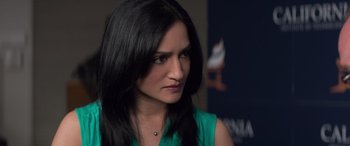 Movie still from “San Andreas” (2015), directed by Brad Peyton – A person with long black hair; Close Up shot, High angle