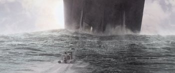 Movie still from “San Andreas” (2015), directed by Brad Peyton – A boat in the water near a large body of water; Extreme Wide shot, High angle