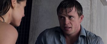 Movie still from “San Andreas” (2015), directed by Brad Peyton – A person with wet hair; Close Up shot, Over the shoulder angle