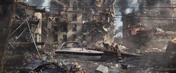 A boat is in the middle of a destroyed city