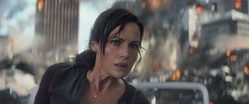 Movie still from “San Andreas” (2015), directed by Brad Peyton – A person wearing a black shirt; Close Up shot, Over the shoulder angle