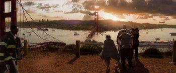 Movie still from “San Andreas” (2015), directed by Brad Peyton – A group of people standing on top of a hill; Extreme Wide shot, High angle