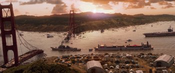 Movie still from “San Andreas” (2015), directed by Brad Peyton – An aerial view of a bridge that has been destroyed; Extreme Wide shot, High angle