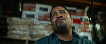 Movie still from “Savage Salvation” (2022), directed by Randall Emmett – A person looking up at something; Close Up shot, Low angle