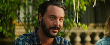 Movie still from “Savage Salvation” (2022), directed by Randall Emmett – A person with a beard; Close Up shot, Over the shoulder angle