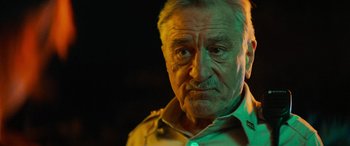 Movie still from “Savage Salvation” (2022), directed by Randall Emmett – An old man with a mustache and a beard; Close Up shot, Low angle