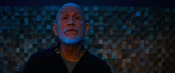 Movie still from “Savage Salvation” (2022), directed by Randall Emmett – An older man with a bald head is looking at the camera; Close Up shot, Low angle