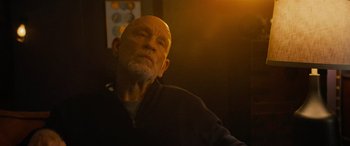 Movie still from “Savage Salvation” (2022), directed by Randall Emmett – An older man with a bald head and a beard; Close Up shot, Low angle