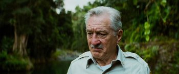 Movie still from “Savage Salvation” (2022), directed by Randall Emmett – An older man with a mustache and a mustache comb; Close Up shot, Low angle