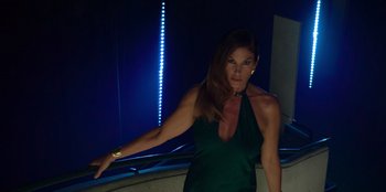Movie still from “Savage x Fenty Show Vol. 3” (2021), directed by Alex Rudzinski – A woman in a green dress posing for a picture; Medium shot, Low angle