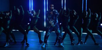 Movie still from “Savage x Fenty Show Vol. 3” (2021), directed by Alex Rudzinski – A group of people dancing on a dance floor; Wide shot, Low angle