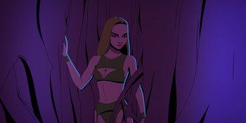 Movie still from “Savage x Fenty Show Vol. 4” (2022), directed by Alex Rudzinski – A woman is standing in front of a purple background; Wide shot, Low angle