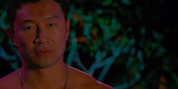 Movie still from “Savage x Fenty Show Vol. 4” (2022), directed by Alex Rudzinski – A person wearing a necklace; Close Up shot, Over the shoulder angle