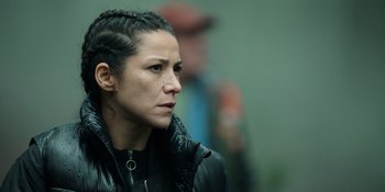 Movie still from “Sayen” (2023), directed by Alexander Witt – A person wearing a black jacket; Close Up shot, Low angle