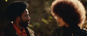 Movie still from “BlacKkKlansman” (2018), directed by Spike Lee – A man and a woman talking to each other; Close Up shot, Over the shoulder angle